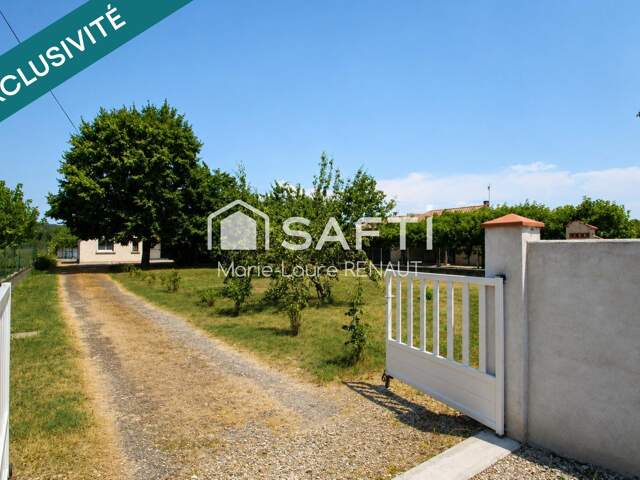 Maison de plain-pied 95m² - DPE B - Terrain env. 2500m² - Garages et dépendances - 3 chambres — photo du bien