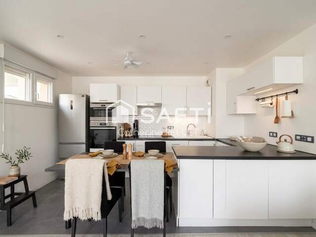 T4 familial avec terrasse privative de 23 m² et place de parking — photo du bien