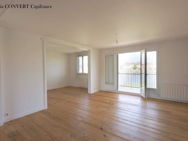 Appartement d'exception 99m² avec garage vue panoramique à SAINT LAURENT SUR SAONE (01) — photo du bien