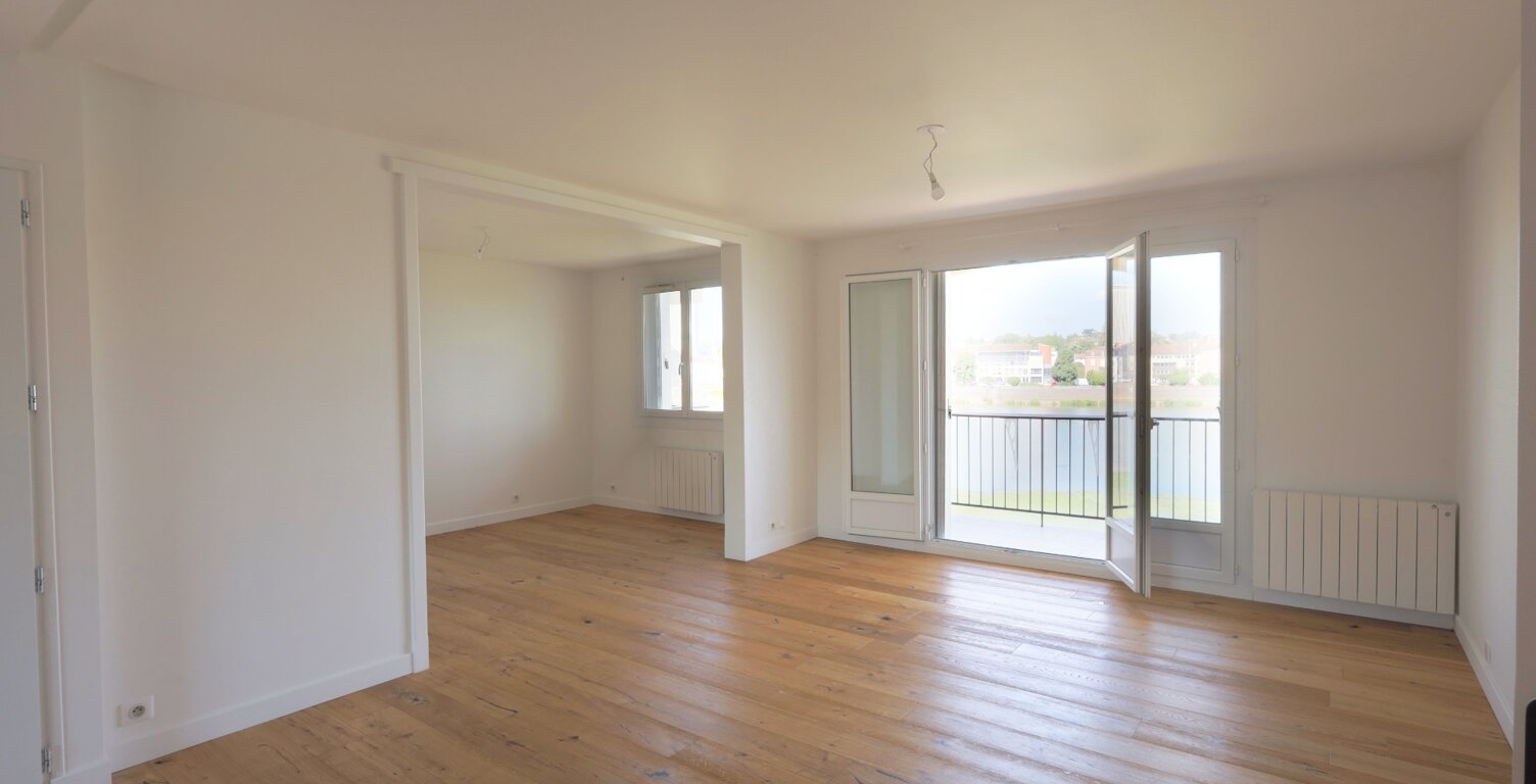 Appartement d'exception 99m² avec garage vue panoramique à SAINT LAURENT SUR SAONE (01) — photo 1
