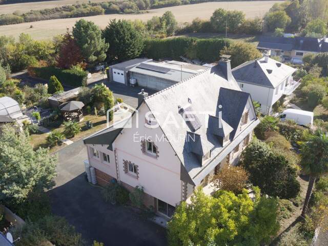 Cette grande Maison familiale avec un hangar professionnel. — photo du bien