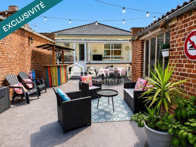 PLAIN PIED INDIVIDUEL - 2 CHAMBRES - VERANDA - JARDIN — photo du bien