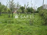 Terrain constructible de 1623m2, idéalement situé dans un environnement verdoyant et paisible et à proximité des commodités. — photo 2