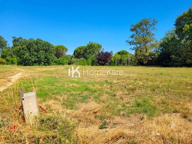 TERRAIN A BATIR 1385M² DANS UN ECRIN DE VERDURE — photo du bien