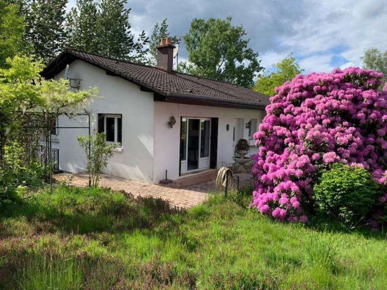 Plain-pied avec sous-sol complet, garage et jardin — photo 1