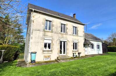 Maison de village indépendante de 4 chambres, comprenant un garage, deux abris de jardin et un barbecue intégré, située sur un terrain de 1 172 m² avec vue sur la campagne — photo du bien