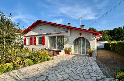 Maison individuelle de plain-pied avec jardin paysagé et beau potentiel — photo du bien