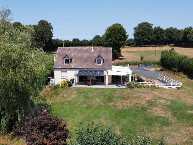 À 5 min de Vire – Pavillon 151 m², 4 chambres dont 1 au RDC – Terrain 2 518 m² — photo du bien