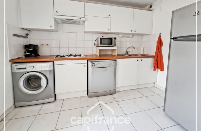Appartement climatisé 3 pièces avec jardin, parking, cave et piscine commune — photo 3