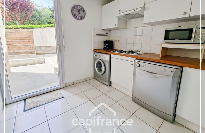 Appartement climatisé 3 pièces avec jardin, parking, cave et piscine commune — photo 4