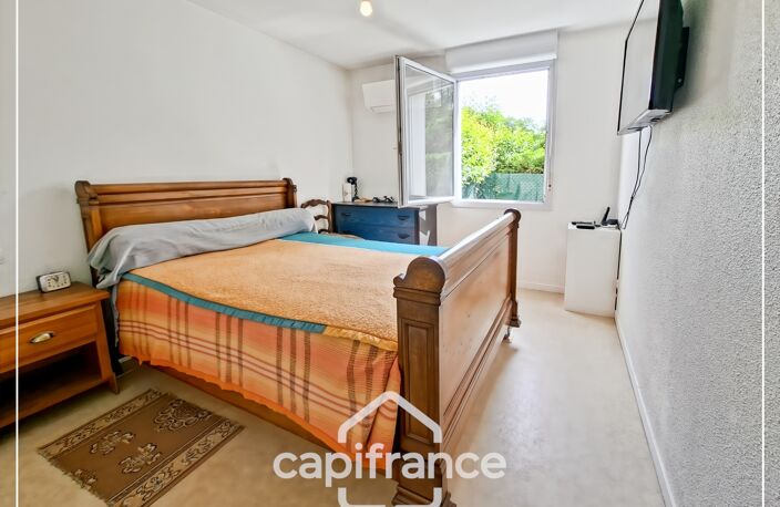 Appartement climatisé 3 pièces avec jardin, parking, cave et piscine commune — photo 5