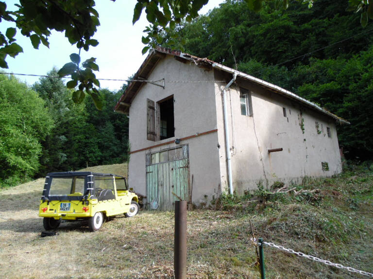 SENONES (Vosges) garage sur deux niveaux — photo 1