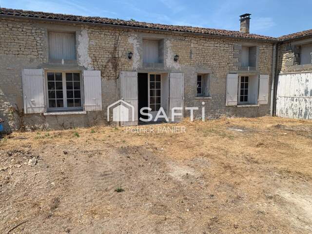 Maison individuelle de caractère avec jardin, garage et dépendance ! — photo du bien