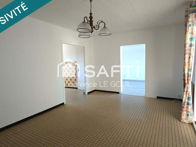MAISON DE PLAIN PIED AVEC DOUBLE GARAGE DANS QUARTIER CALME — photo du bien