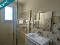 MAISON DE PLAIN PIED AVEC DOUBLE GARAGE DANS QUARTIER CALME — photo 4
