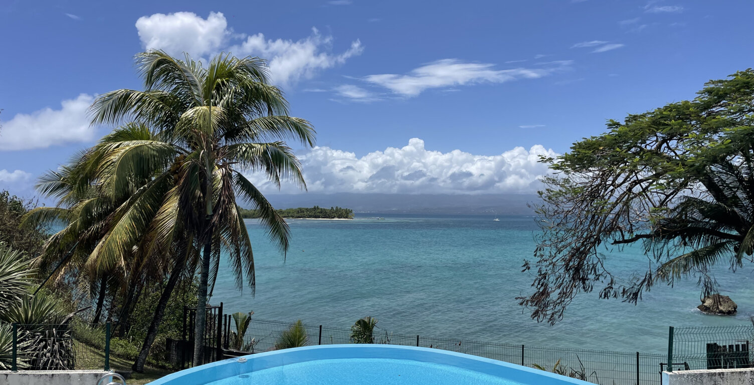 MAGNIFIQUE APPARTEMENT T3 MEUBLE GOSIER AVEC PISCINE ET VUE — photo 1