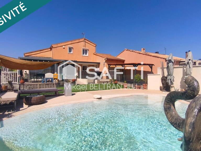 Une villa d'exception où élégance, volumes et prestations haut de gamme se rencontrent — photo 1