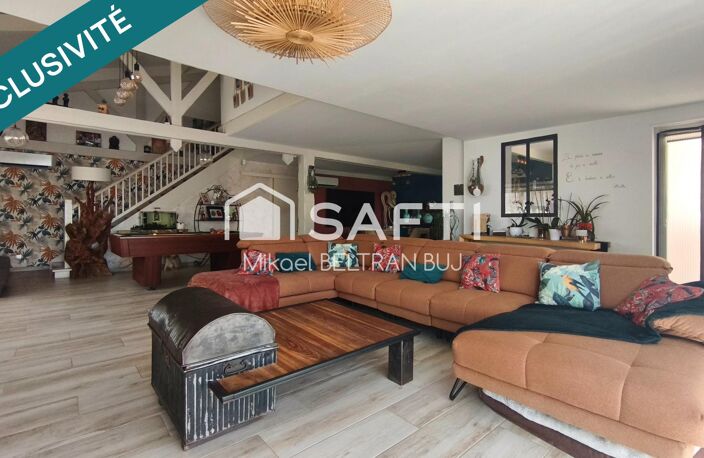 Une villa d'exception où élégance, volumes et prestations haut de gamme se rencontrent — photo 4