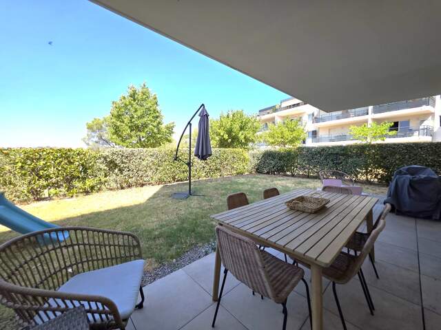 APPARTEMENT - REZ DE JARDIN -  2 chambres - jardin  - parking — photo du bien