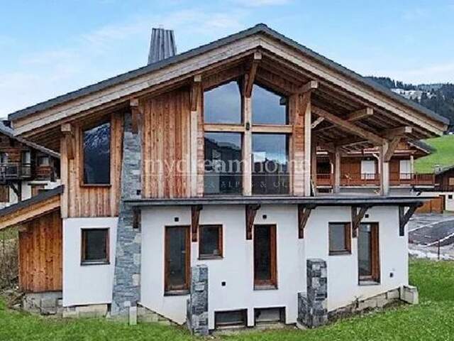 Magnifique chalet 4 chambres au pied des pistes de — photo du bien