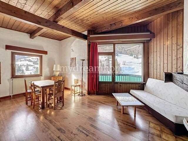 Appartement 2 chambres 68,58m² centre du village d — photo du bien