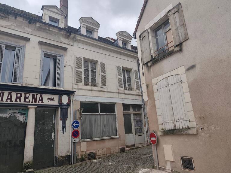 Bien de caractère en plein centre-ville — photo 1