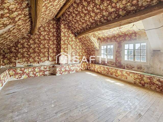 Maison familiale avec logement indépendant et grand garage. — photo du bien