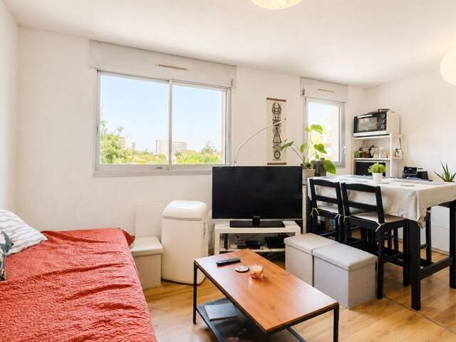 TOULOUSE 31400 Appartement T1 Bis duplex dernier étage avec parking sous-sol — photo du bien