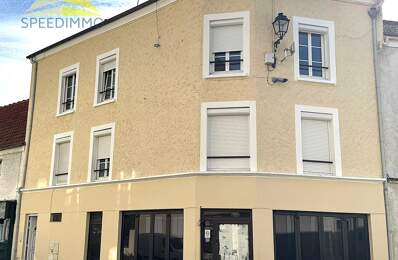 IMMEUBLE DE RAPPORT – COMMERCE + 3 APPARTEMENTS — photo du bien
