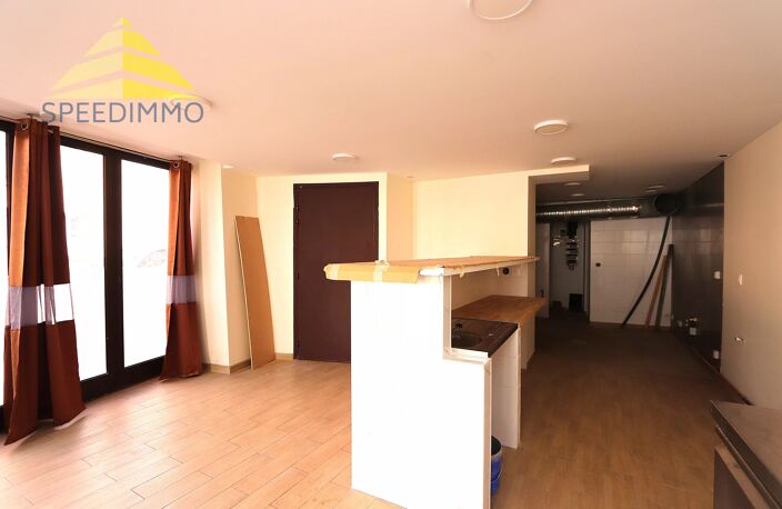 IMMEUBLE DE RAPPORT – COMMERCE + 3 APPARTEMENTS — photo 3