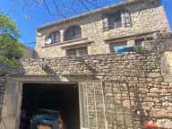 ISSIRAC (30) - L'authenticité du Gard provençal : maison en pierre, garage, dépendances et cour plein sud — photo 3