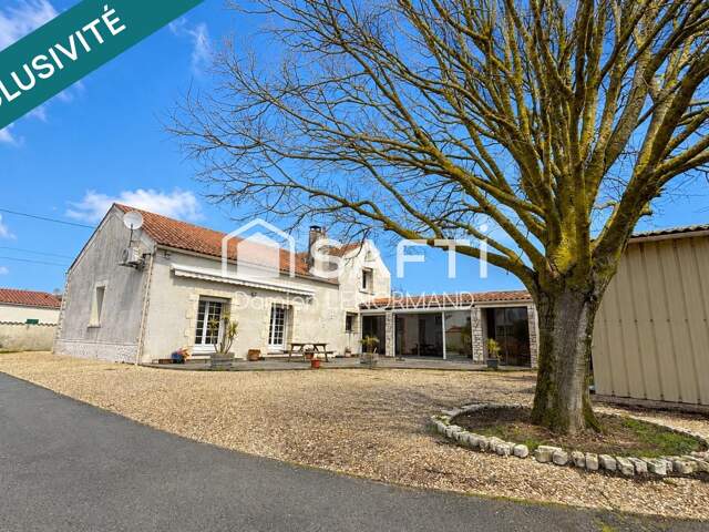 Maison plein centre de la cotiniere avec hangar — photo du bien