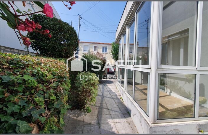 Ses atouts pour cet appartement résident dans son agencement fonctionnel, quartier recherché, garage et place de parking privé avec borne de recharge — photo 3