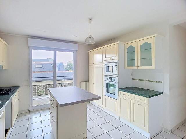 T4 traversant, 2 balcons, cave et garage — photo du bien