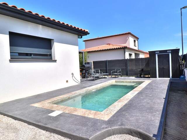 Villa  4 pièce(s) 102 m2 sur un terrain de 336m² avec piscine — photo du bien