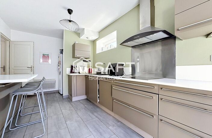 Une maison, chaleureuse, confortable et fonctionnelle — photo 4