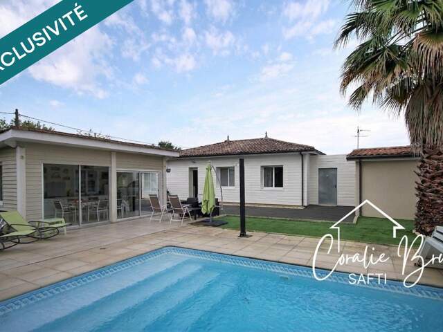 Maison 135 m² avec piscine et jardin paysager — photo du bien
