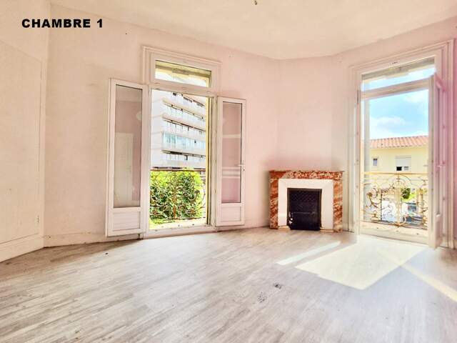 Appartement T3 traversant de 80 m² (1er étage) + Cave (6m2) — photo du bien