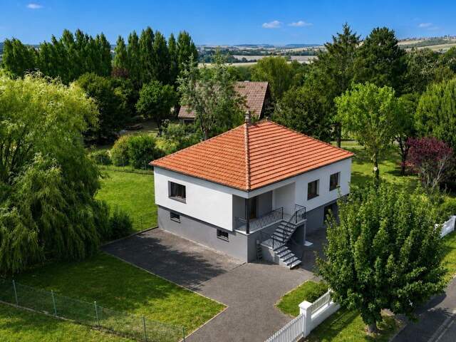 FAULQUEMONT  Maison de plain-pied sur sous sol complet, cadre verdoyant et 76 ares de propriété — photo du bien