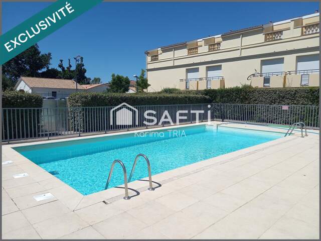Appartement duplex 2 pièces avec terrasse, balcon, piscine et parking — photo du bien