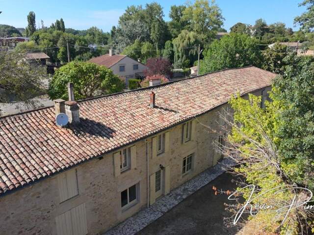 Longère en pierre de 219 m² à fort potentiel avec dépendances et jardin – Sainte-Radegonde (33) — photo du bien