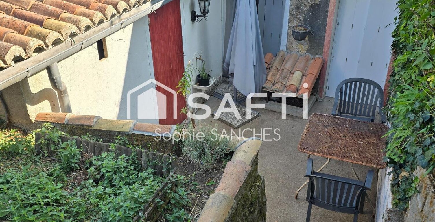 maison centre bourg avec un jardin — photo 1