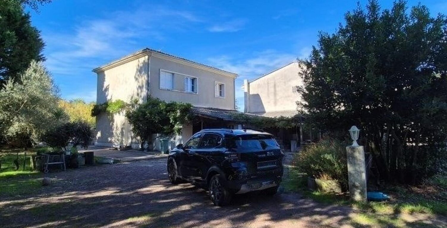 maison à étage de 130 m2 et 60m2 de véranda sur un joli terrain arboré de 1006 m2 avec une dépendance habitable — photo 1