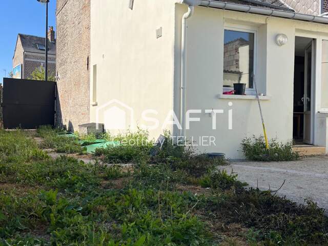 Maison avec terrain en ville — photo du bien