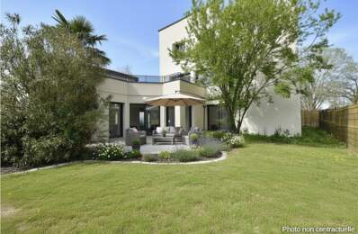 EXCLUSIVITE - Appartement T4 rez de jardin - Garage et parkings — photo du bien