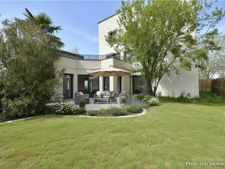 EXCLUSIVITE - Appartement T4 rez de jardin - Garage et parkings — photo 1