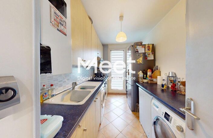 APPARTEMENT - 61,67M2 - 2 CHAMBRES - BALCON - PARKING — photo 5