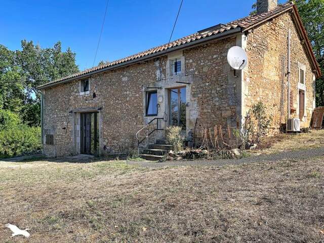 Maison en pierre de 6 pièces principales — photo du bien