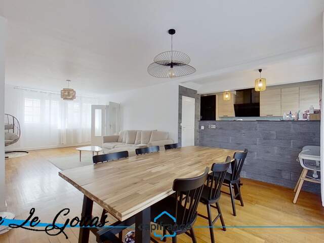 Maison jumelée de 114m² avec garage et jardin — photo du bien