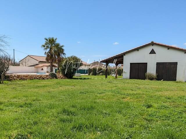 Grange et vaste terrain de 1135 m² – Potentiel d'agrandissement – Lavernose-Lacasse — photo du bien